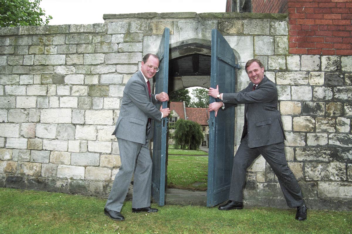 Sir Ronald Cooke (left) officially opening the door to King's Manor Gardens, July 1994 (York Digital Library)